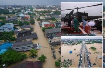 Famílias no sul da Tailândia empoleiraram-se nos telhados para escapar das inundações que mataram pelo menos 33 pessoas