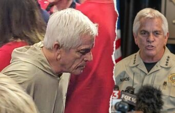 O xerife Chris Nanos aparece em um jogo de basquete durante a busca por Nancy Guthrie