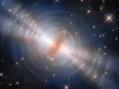 Uma estrela escondida brilha com feixes gêmeos em impressionante imagem do Telescópio Espacial Hubble