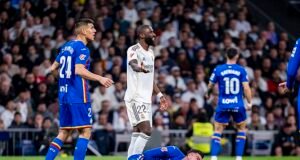 Antonio Rudiger recebe cartão vermelho por ‘uma das faltas mais brutais já vistas’ na surpreendente derrota do Real Madrid – enquanto os torcedores gritam para Florentino Perez e o ex-zagueiro do West Brom zomba de Vinicius Jr.
