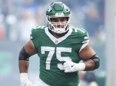 Patriotas concordam com os termos do OL Alijah Vera-Tucker