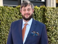 Eugene Merman foi retirado do carro em chamas no pátio do NH e levado ao hospital