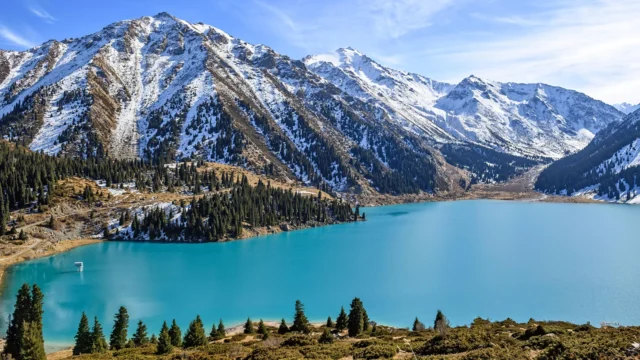 big-almaty-lake-snowy-mountain-peaks-kazakhstan.webp.webp