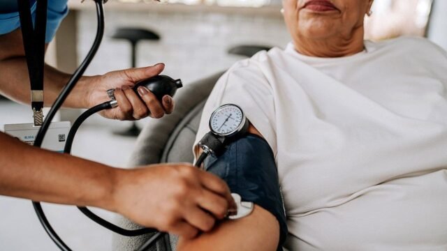 woman_getting_blood_pressure_tested.jpeg